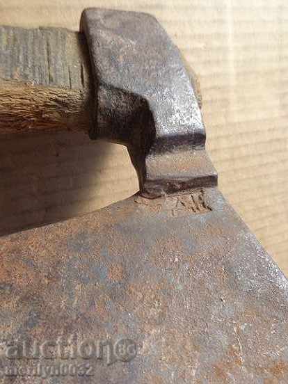 Auction An old ax, a curve with a print of a toothed toothed saddle hat Auction An old ax, a curve with a print of a toothed toothed saddle hat