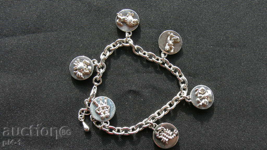 An old massive bracelet with a zodiac with price 15.00 BGN | € 7.67 An old massive bracelet with a zodiac with price 15.00 BGN | € 7.67