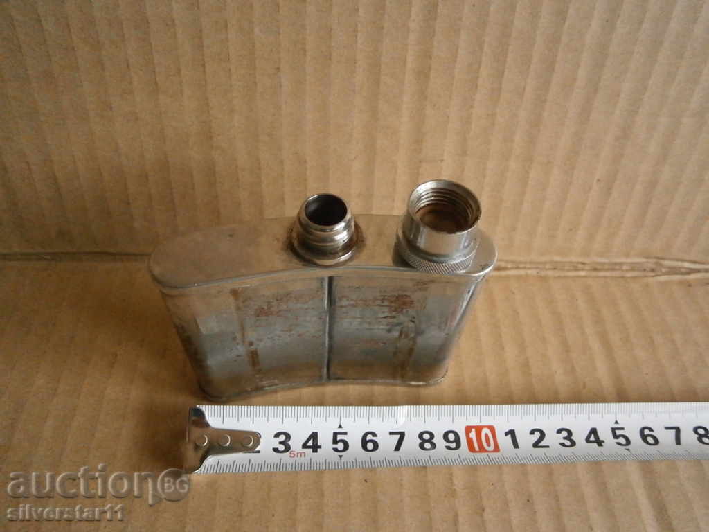 Delivery of a small metal bottle for alcohol Delivery of a small metal bottle for alcohol