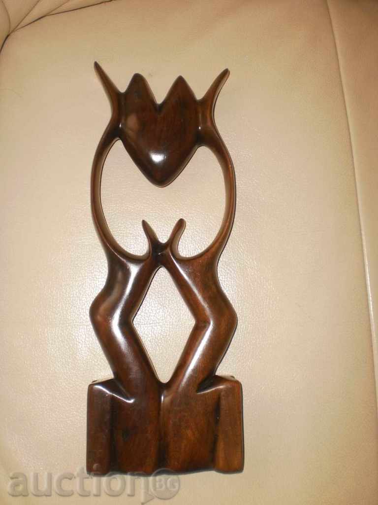 Delivery of Love couple-composition of ebony tree Delivery of Love couple-composition of ebony tree