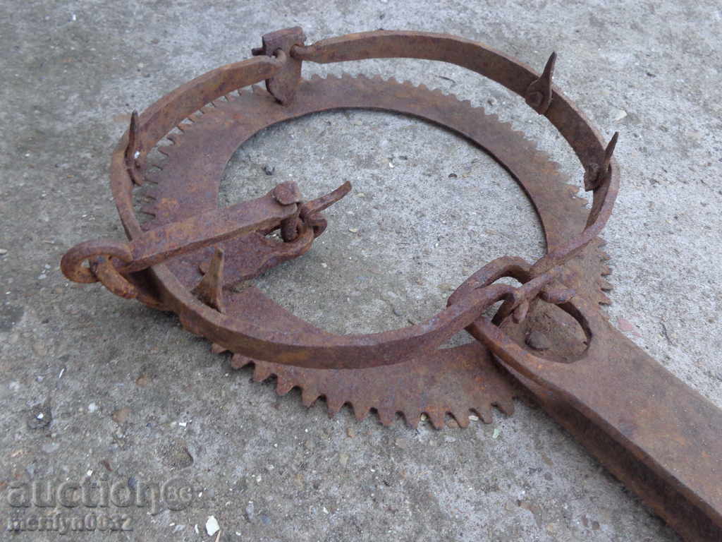 Auction  Old hand forged trap, wrought iron