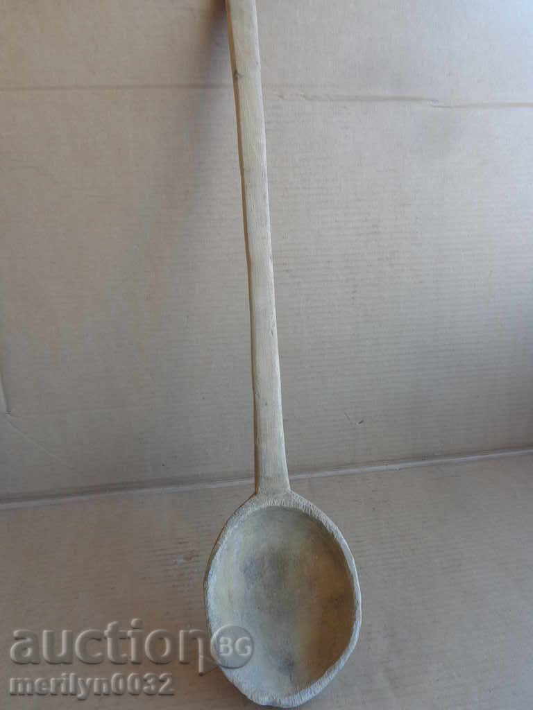 Delivery of Very old wooden spoon, ladle, wooden Delivery of Very old wooden spoon, ladle, wooden