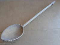 Very old wooden spoon, ladle, wooden
