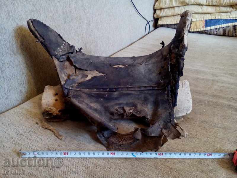 Antique saddle for a goat, ram Antique saddle for a goat, ram