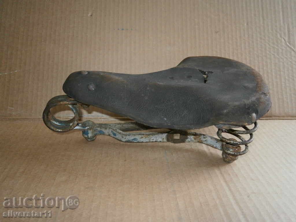 Auction an antique leather seat Auction an antique leather seat