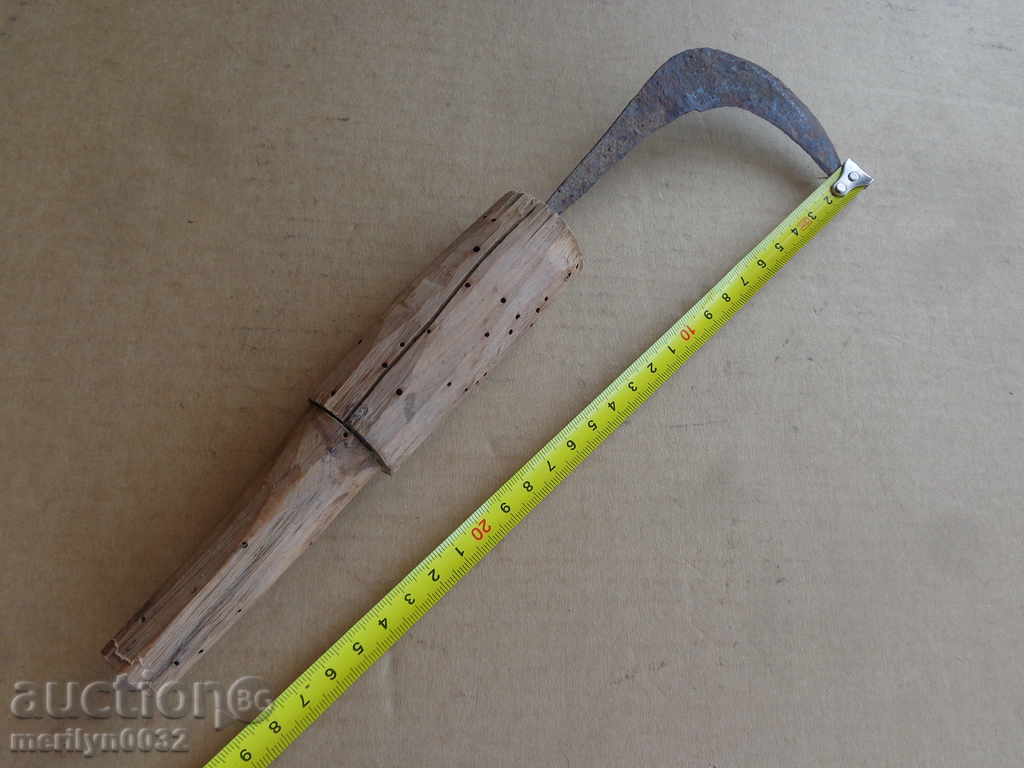 Auction An old hand forged hammer, wrought iron, a chopper, a knife Auction An old hand forged hammer, wrought iron, a chopper, a knife