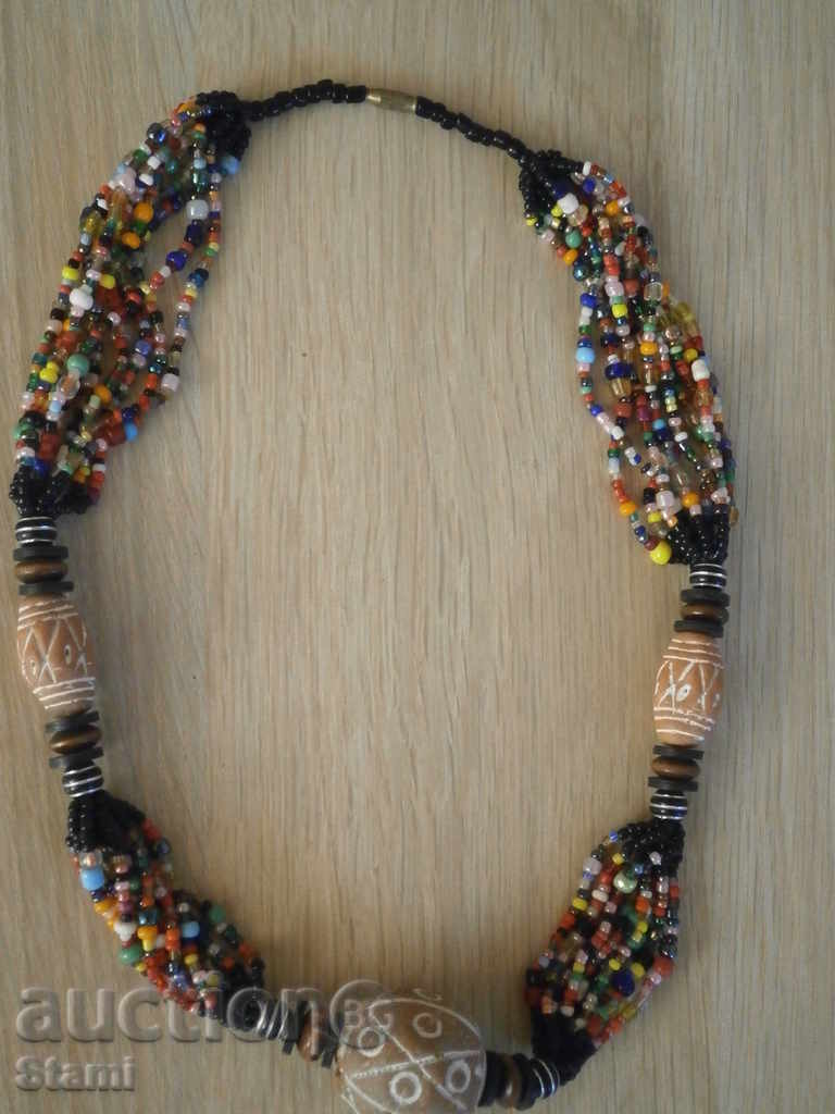 Traditional African necklace - a combination of sand beads with price 59.00 BGN | € 30.17 Traditional African necklace - a combination of sand beads with price 59.00 BGN | € 30.17