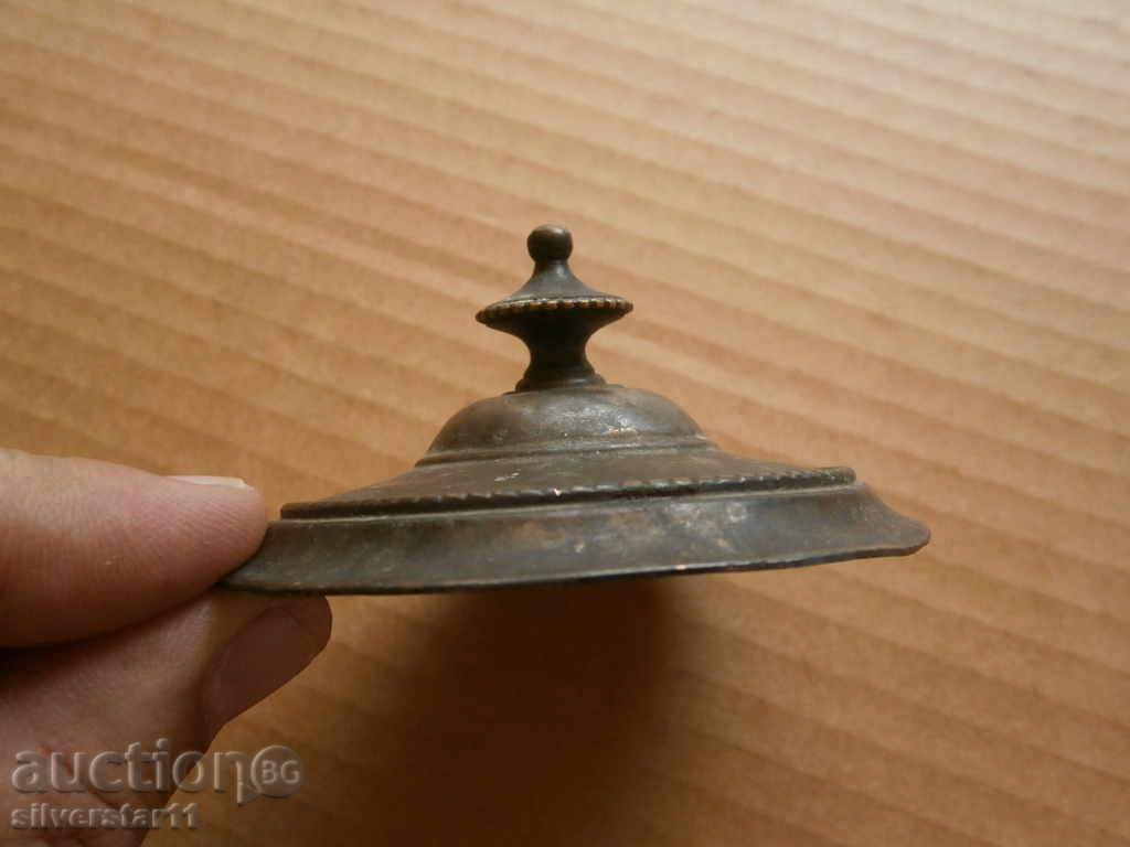 Auction  an old bronze cover of a sugar bowl