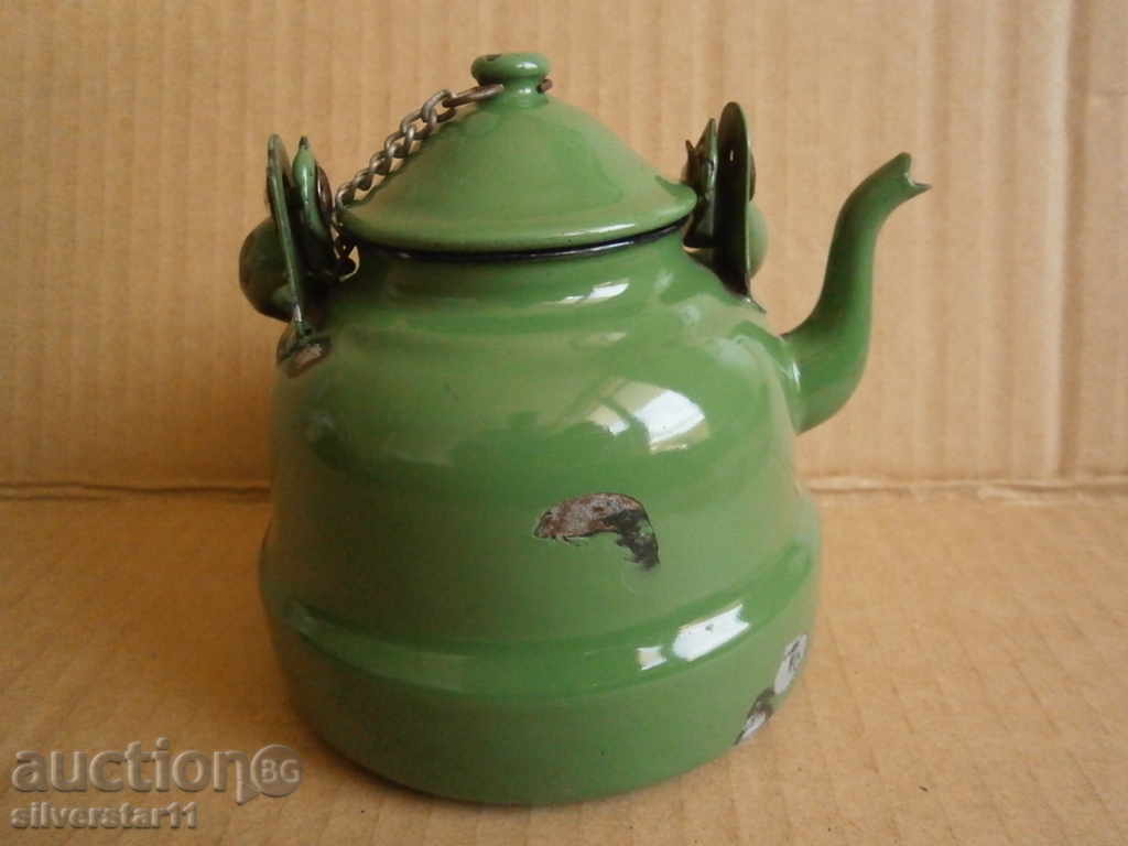 Auction  a small enamel teapot