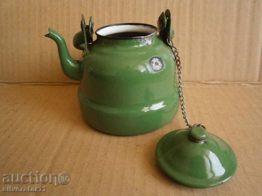 Delivery of a small enamel teapot