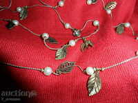 NECKLACE with pearls, petals, swallows d-a 100 cm