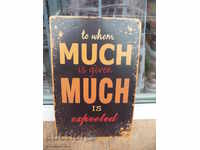 Metal sign lettering message Many great expectations