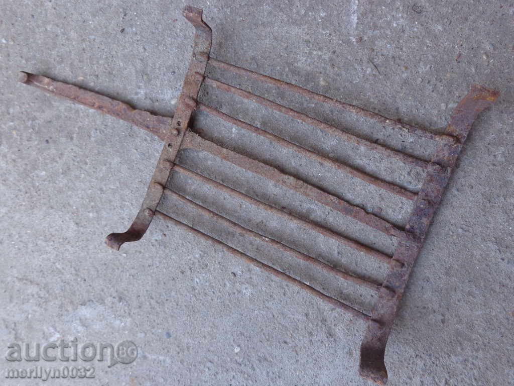 An old hand-forged grill, a steak, wrought iron - 6
