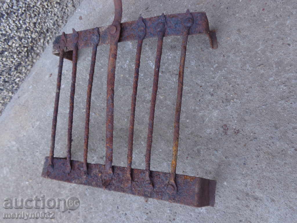 An old hand-forged grill, a steak, wrought iron - 5