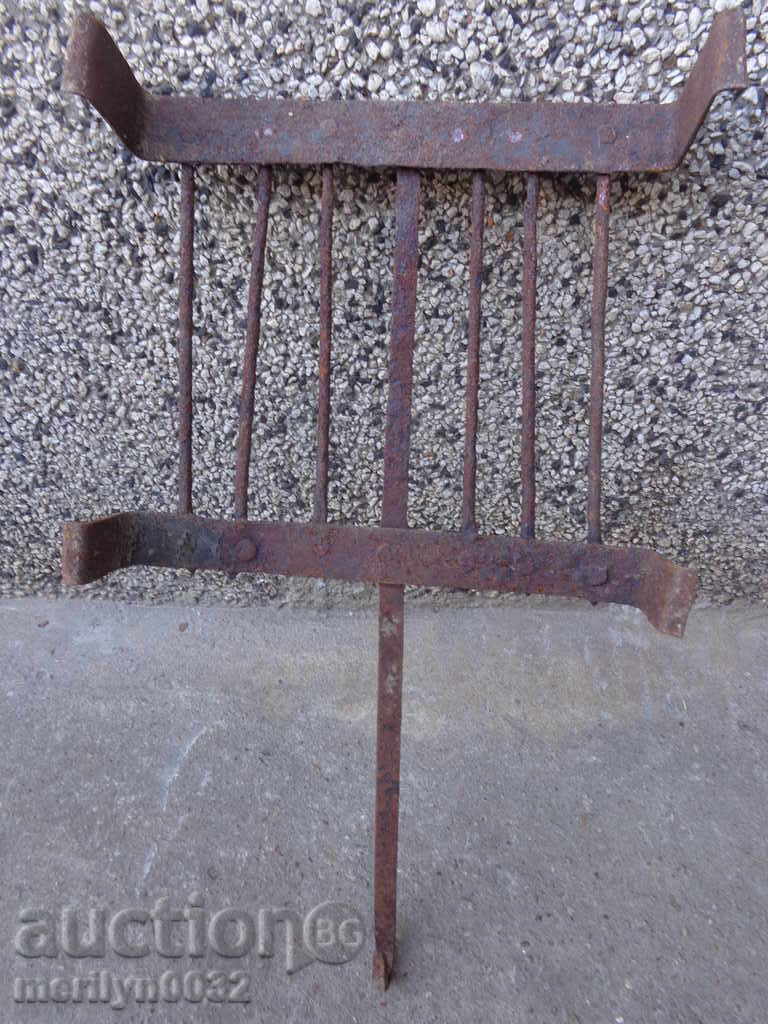 An old hand-forged grill, a steak, wrought iron - 6