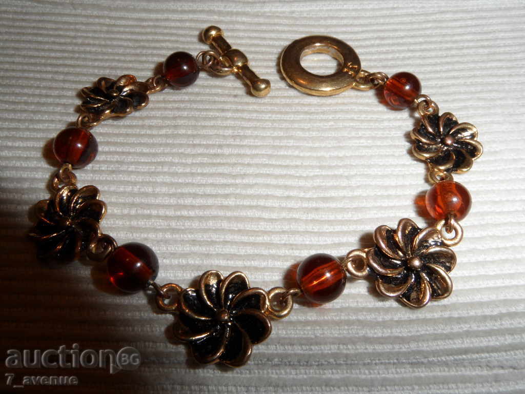 Hryvnia in gold color, length 19.5cm, width 14mm. Very beautiful!