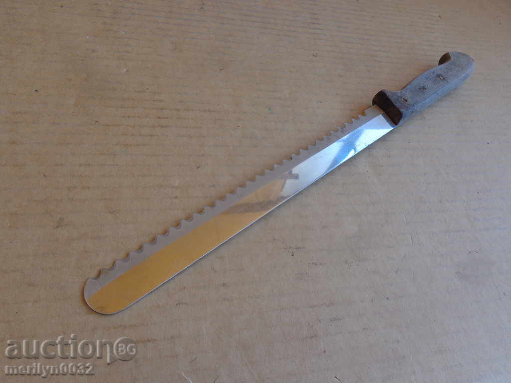 Old knife with saw blade