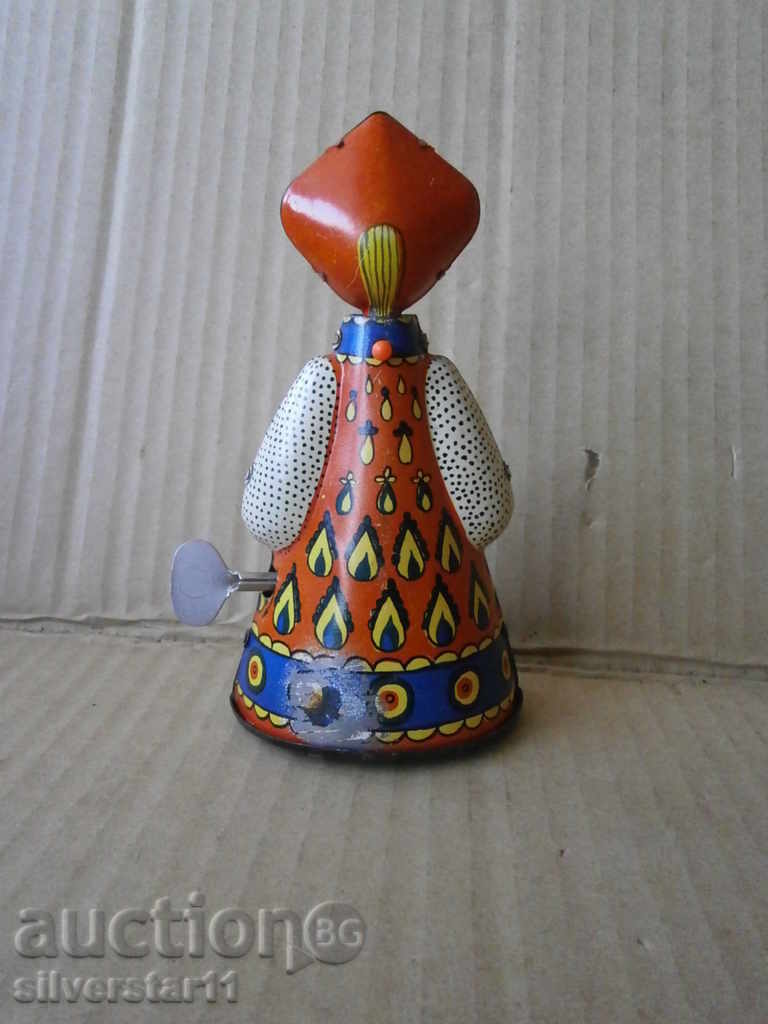 Auction Metal Sheet Rolling Doll WORKING Auction Metal Sheet Rolling Doll WORKING