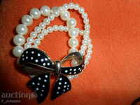 GRAVNA cu 3 rânduri de perle și panglică frumoasă Este minunat!