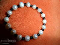 GRAVENA with a. white pearls 0.8 cm Beautiful!