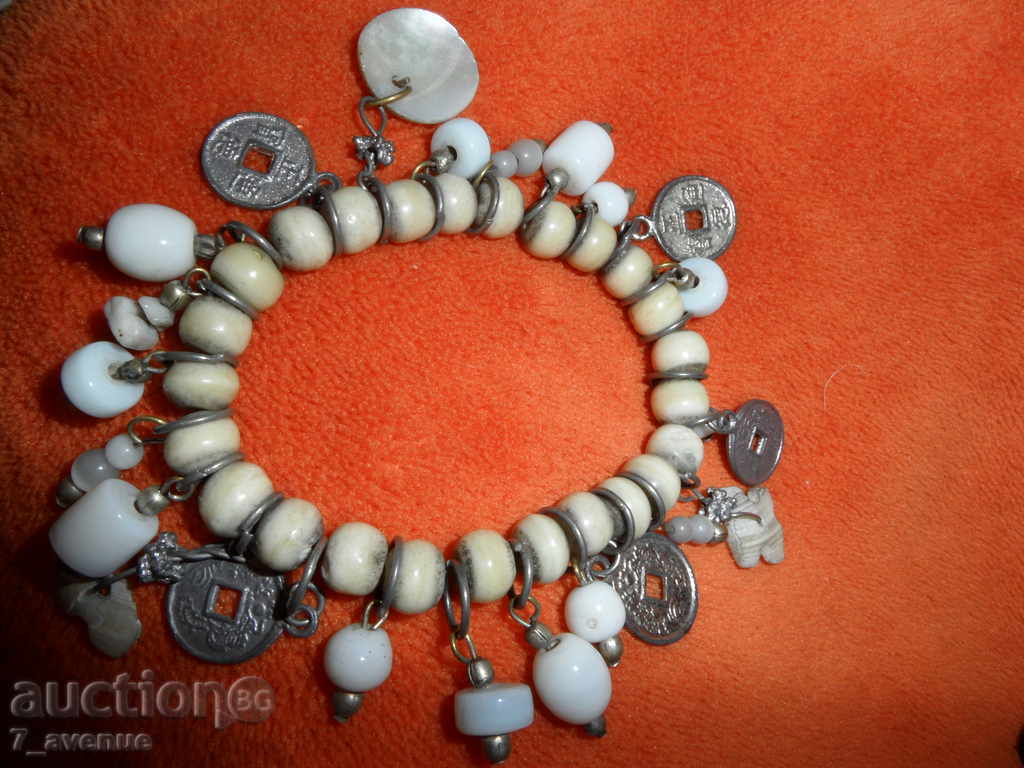 Necklace rich in stones and pendants. It's beautiful!