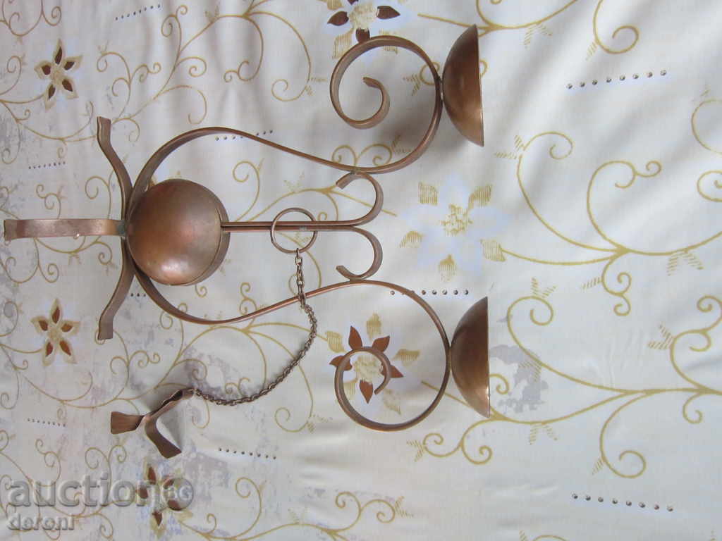 Delivery of An old candlestick made of copper lamp candle lantern Delivery of An old candlestick made of copper lamp candle lantern