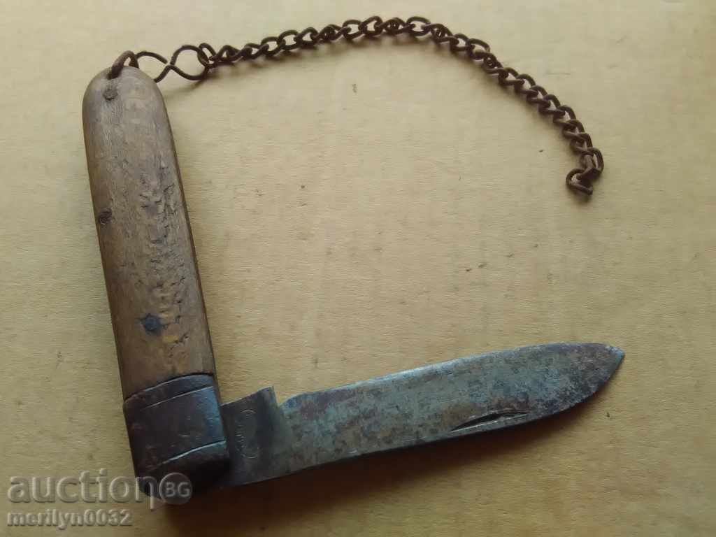 Delivery of An old knife with wood shavings, a knife, a dagger, a blade Delivery of An old knife with wood shavings, a knife, a dagger, a blade