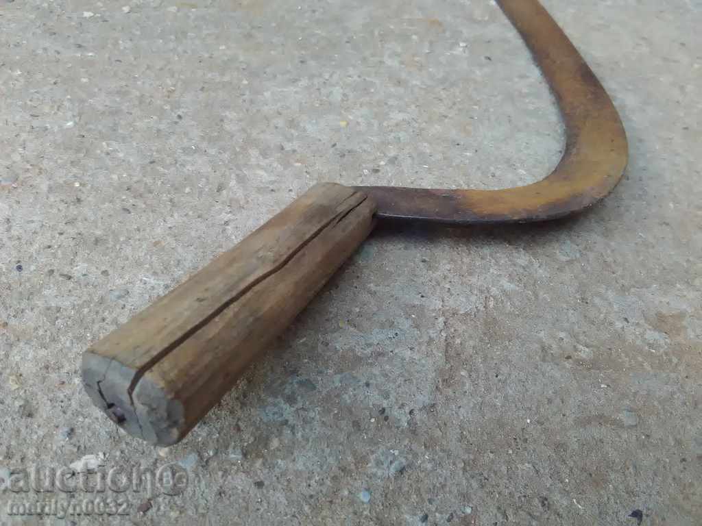 Auction  An old sickle with a seal, a knife, a blade, a wrought iron