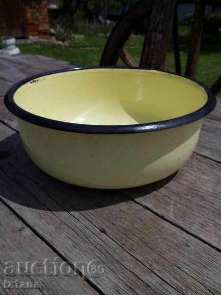 Old enameled bowl, pan