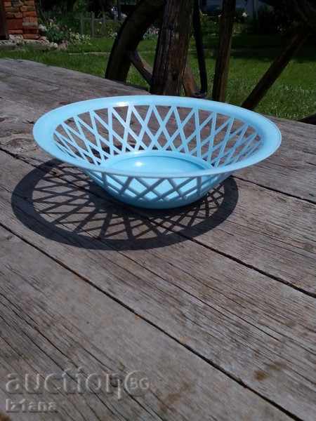 An old plastic fruit bowl