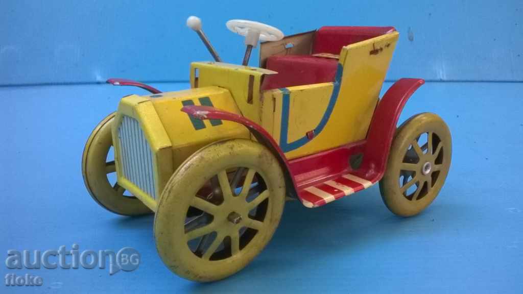 Auction  Tin stroller-old
