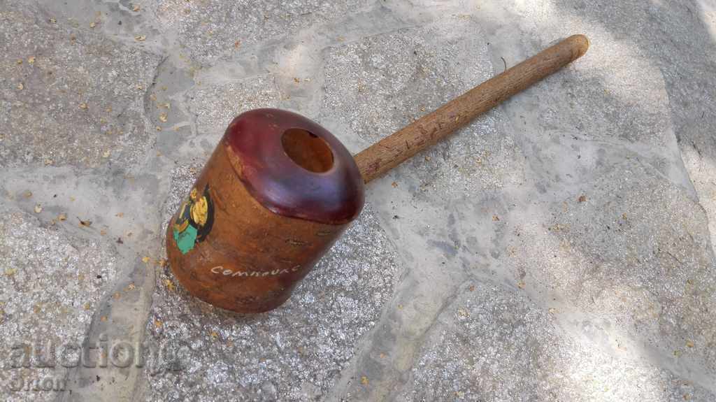 A wooden pipe for - opium