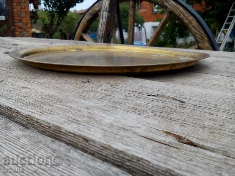An old brass tray with price 20.00 BGN | € 10.23 An old brass tray with price 20.00 BGN | € 10.23
