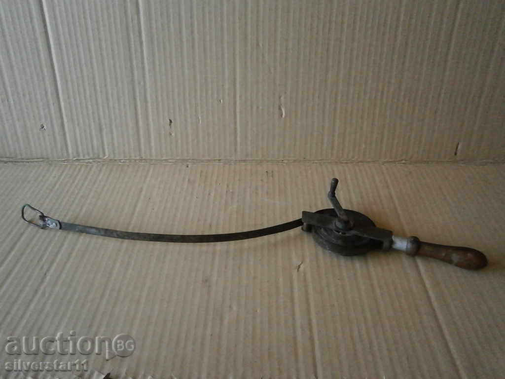 Auction Old roulette with wooden handle Auction Old roulette with wooden handle