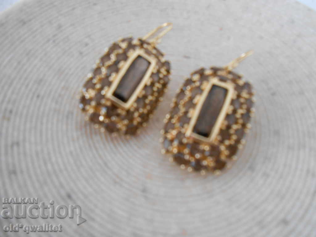 Πολυτελή ασημένια σκουλαρίκια με επιχρυσωμένο, καπνιστό χαλαζία με τιμή 397.00 BGN | € 202.98 Πολυτελή ασημένια σκουλαρίκια με επιχρυσωμένο, καπνιστό χαλαζία με τιμή 397.00 BGN | € 202.98