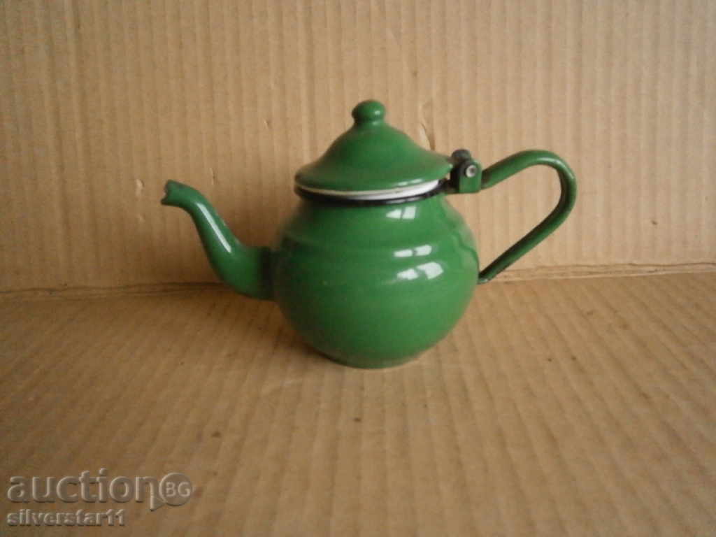 Auction  a small enamel teapot
