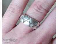 SILVER RING WITH CYCLONS