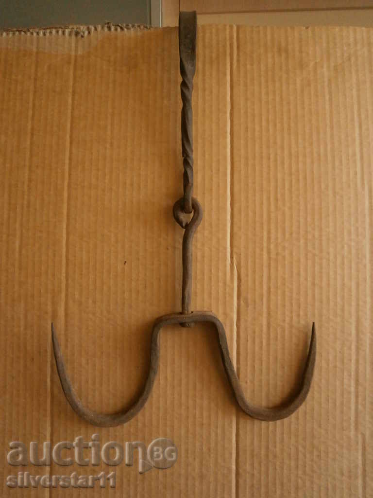 Ancient hand-wrought ironing hook