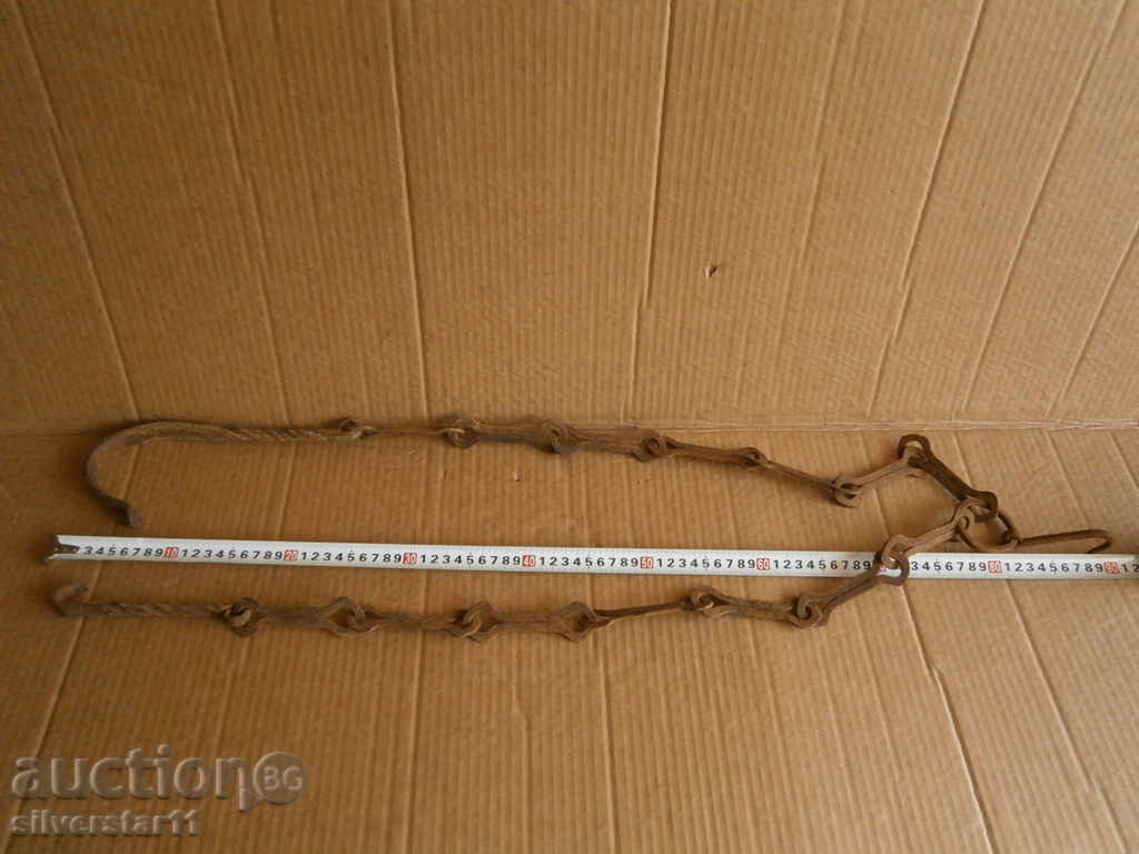 Auction  Old forged chain with hook, hearth for hearth