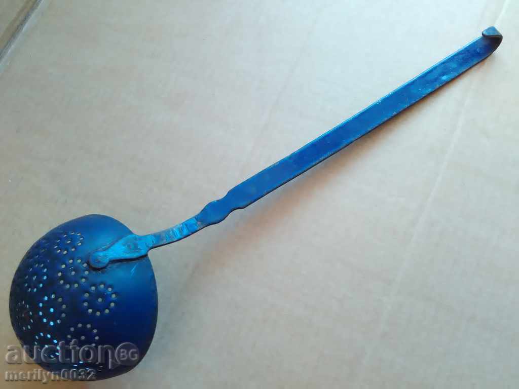 Old enameled spoon with enamel, ladle
