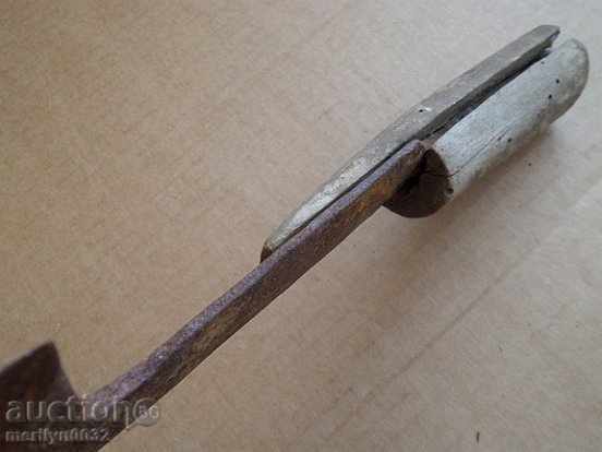Delivery of Old instrument picker with engraved wrought iron blade Delivery of Old instrument picker with engraved wrought iron blade