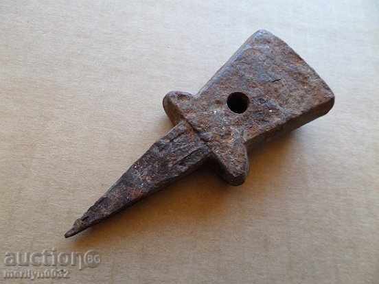 Auction  A primitive anvil for hair peeling
