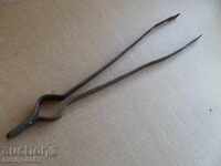 Old hand forged dilaf, wrought iron, mask