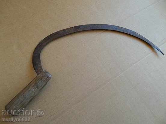 Auction An old sickle with a seal, a knife, a blade, a wrought iron Auction An old sickle with a seal, a knife, a blade, a wrought iron