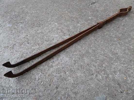 Auction  Old hand forged dilaf, wrought iron, mask