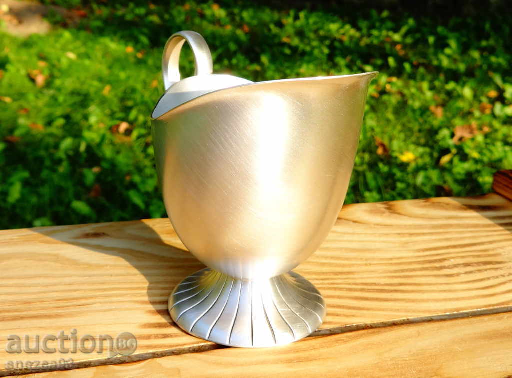 Auction  Silver-plated pitcher, milk jug made of bronze