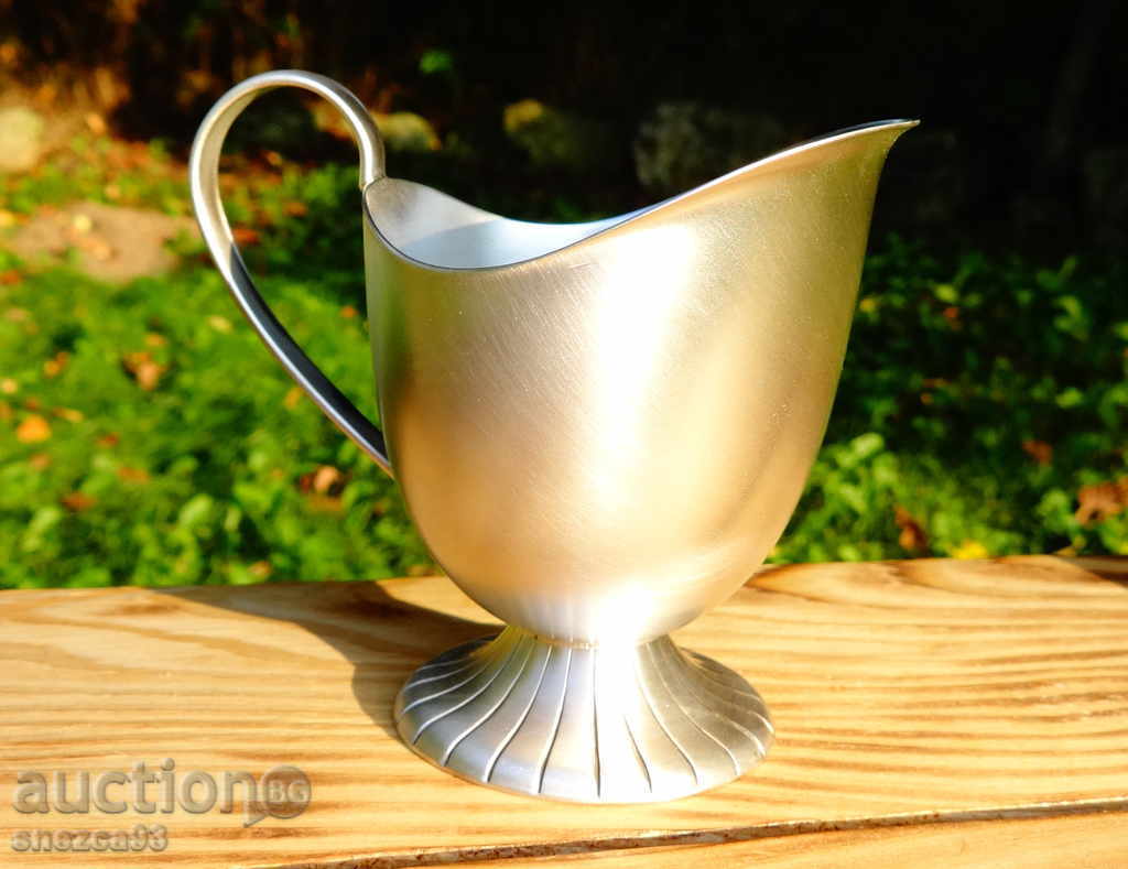 Silver-plated pitcher, milk jug made of bronze