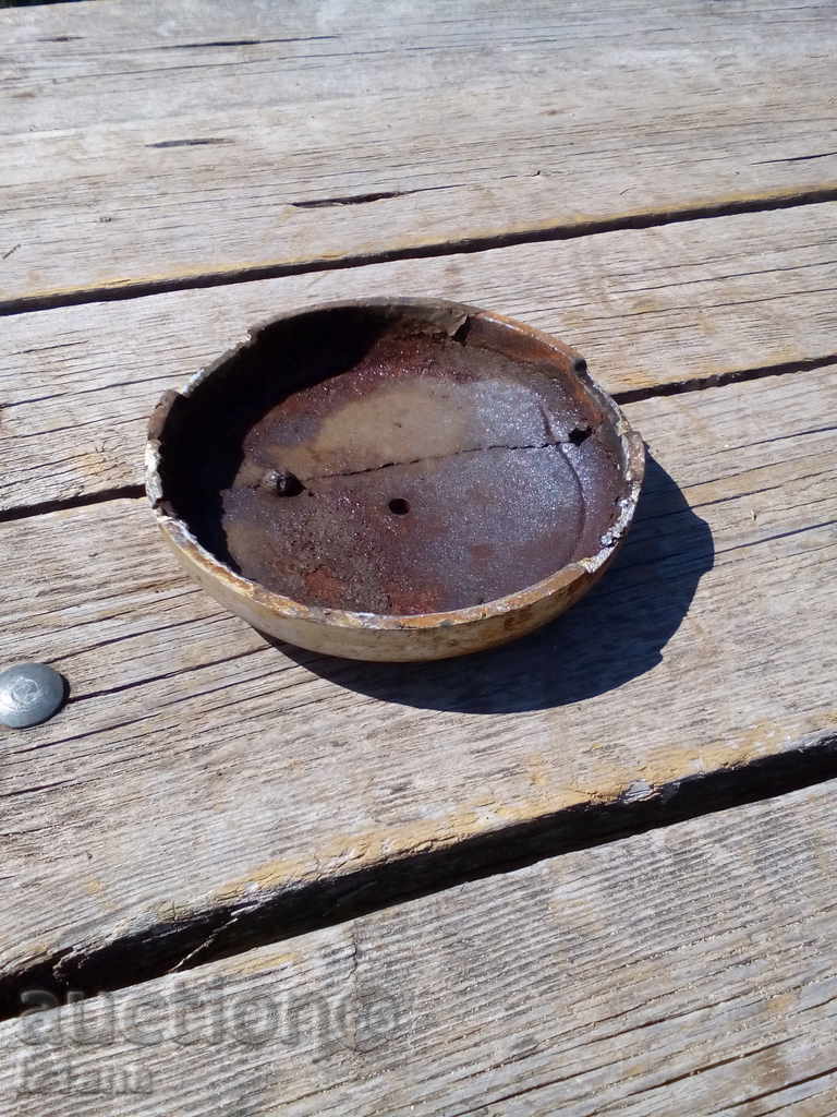 Delivery of An old lid from the stove