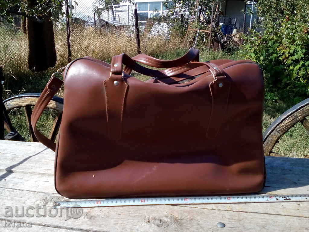 Auction  An old leather bag, a bag