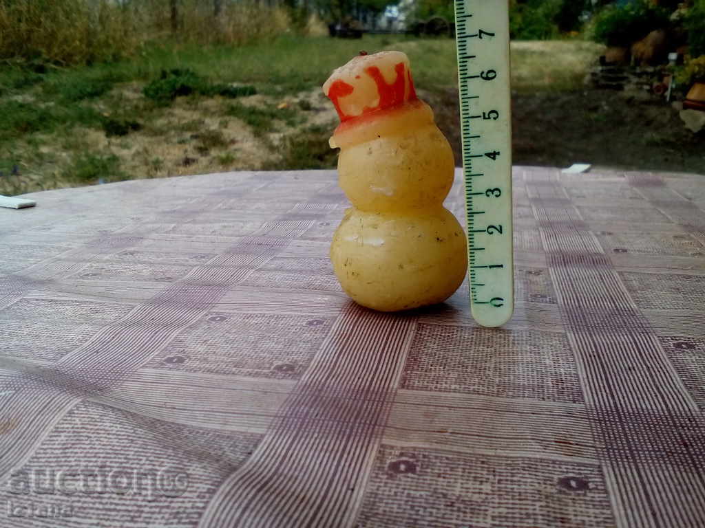 Licitație Lumânare, om de zăpadă